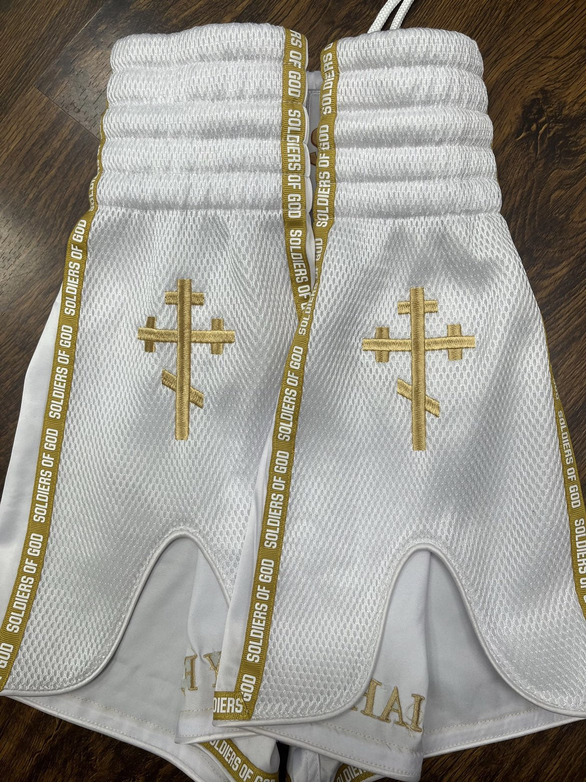 Soldiers Of God White and Gold Muay Thai Shorts.